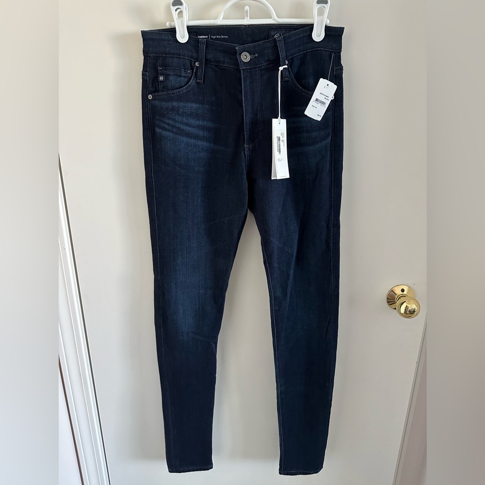 AG skinny jeans, in dark blue wash. Size 27.